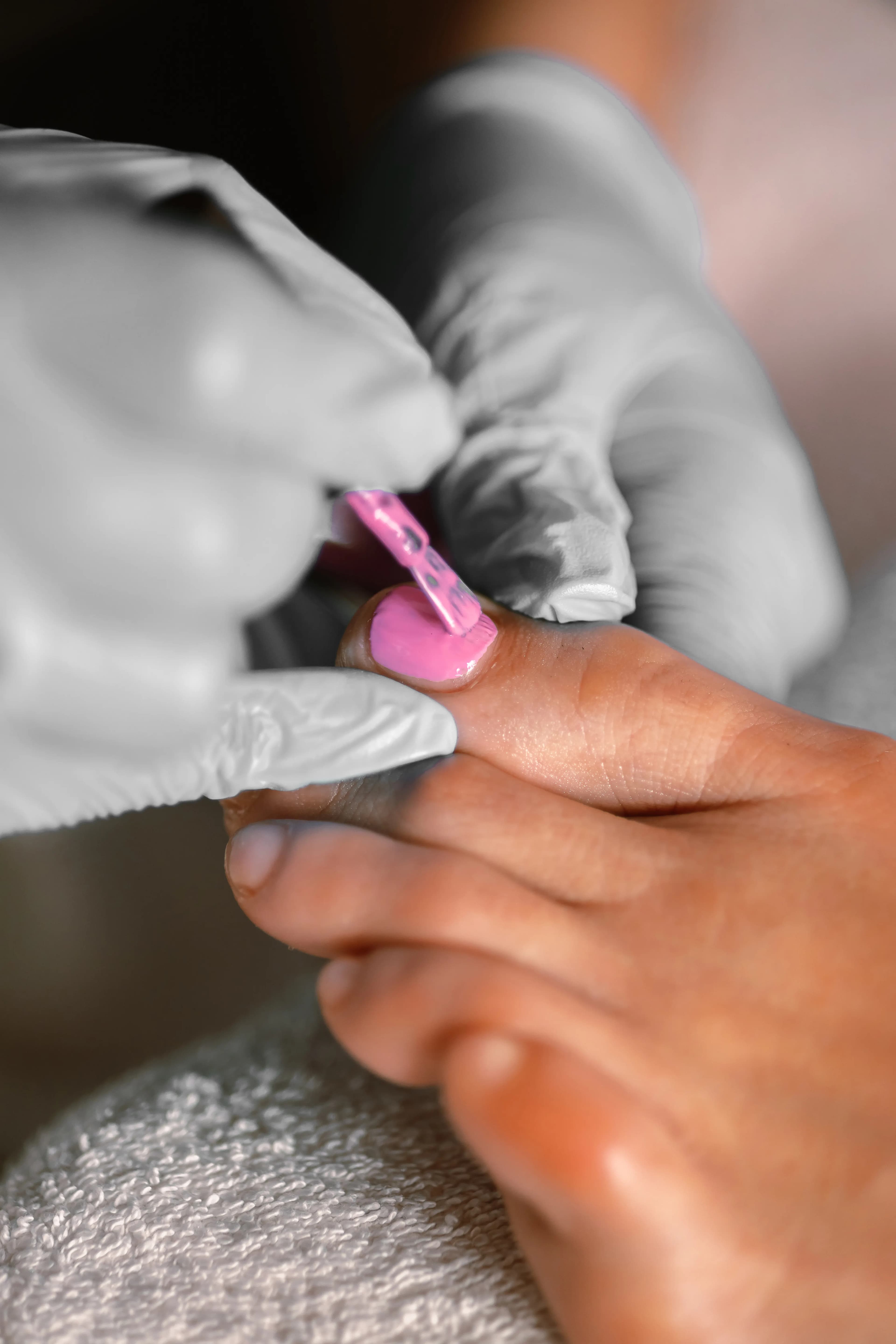 A client having a pedicure in a calm treatment room